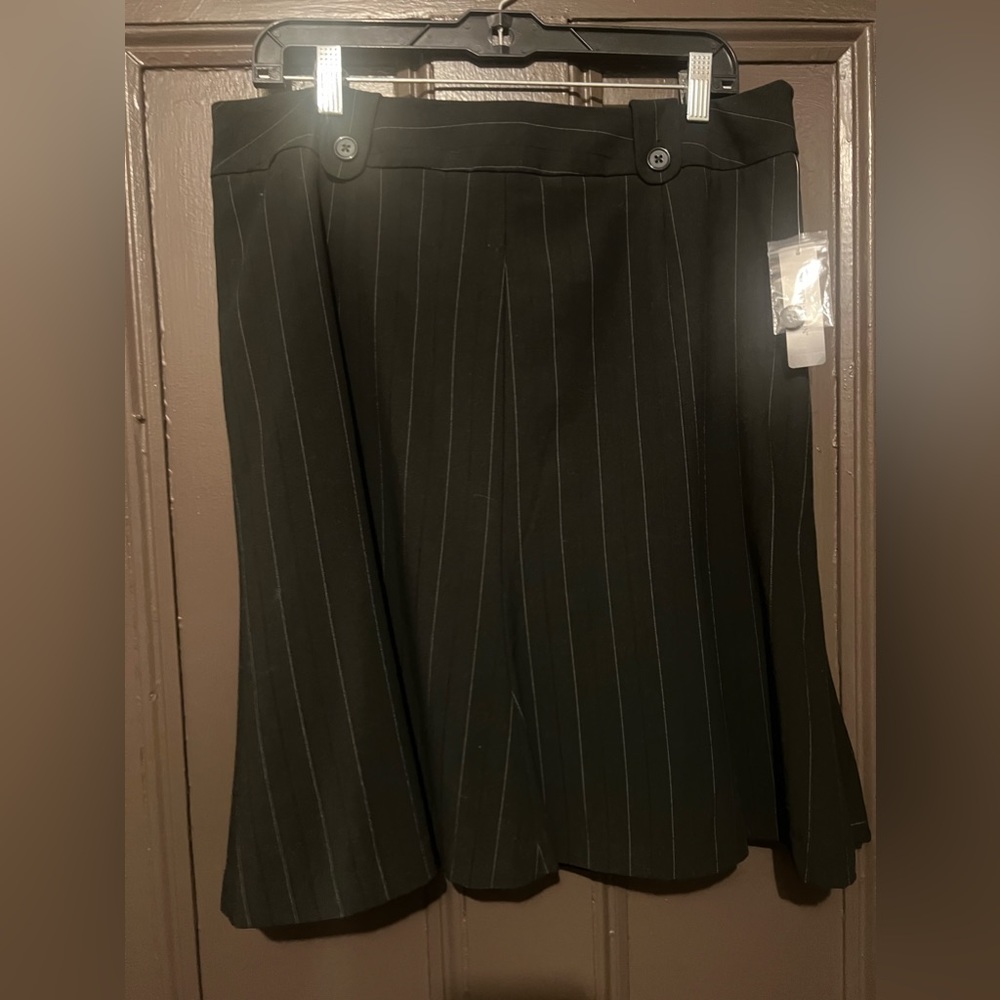 NWOT Worthington Black A-Line Skirt. Item
has been washed but never worn.